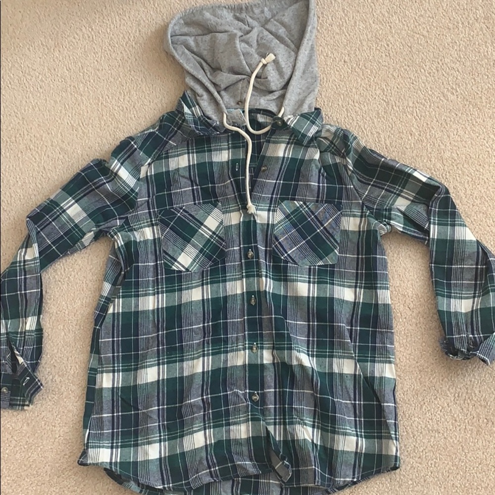 A flannel button up with a a hoodie